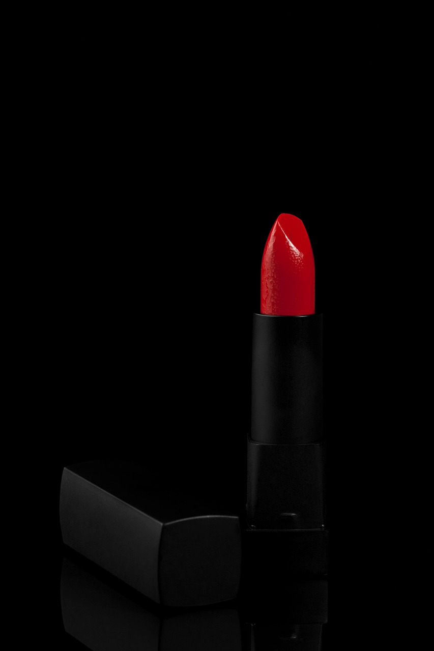 Portfolio makeup, cosmetics, lipstick, beauty product styled on black background
