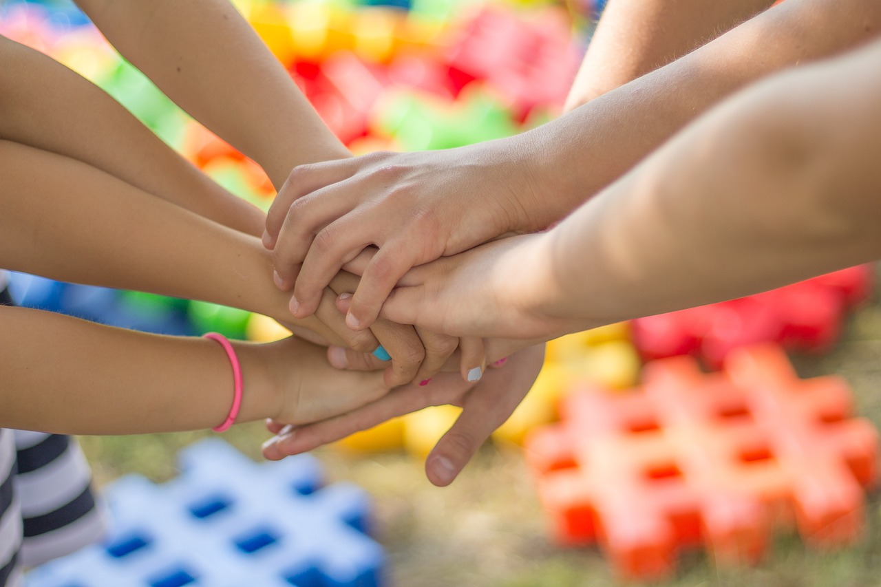 Joined hands — community support