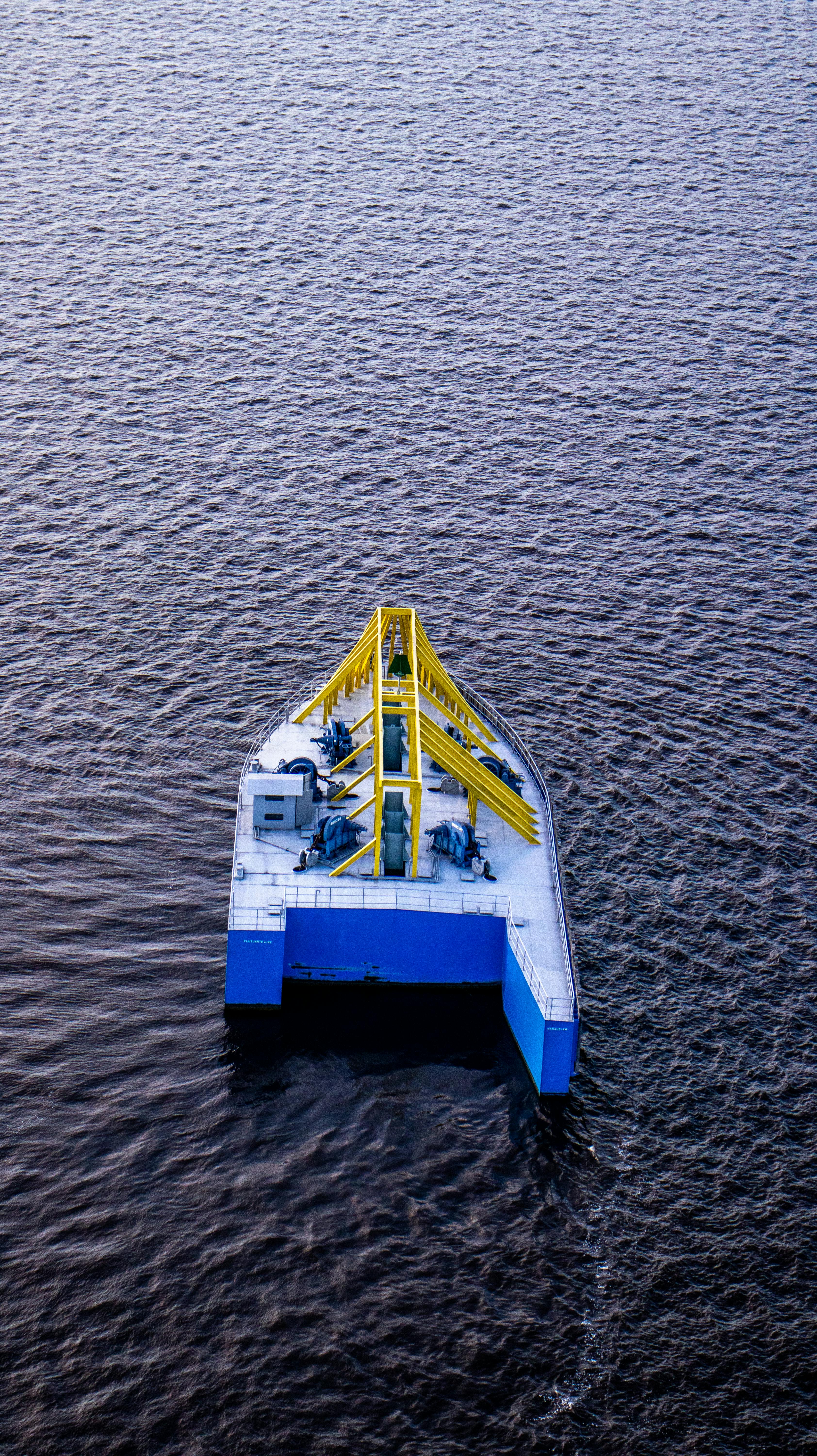 A striking aerial image of a contemporary boat on Rio Negro in Manaus, Brazil.